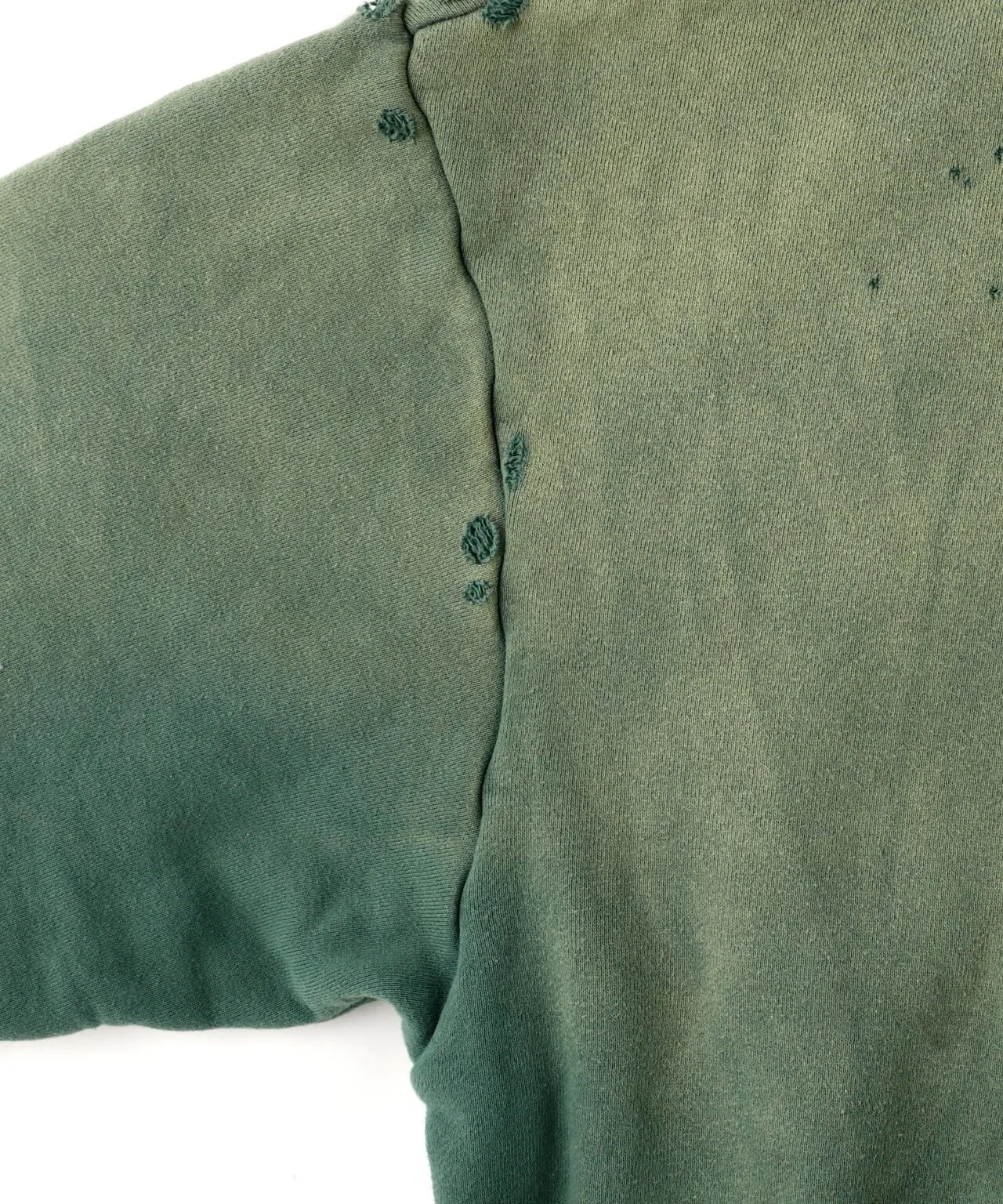 SAINT Mxxxxxx DBL FACE ZIP UP HOODIE/GREEN Double-layer destroyed waffle zipper jacket, washed green S-XL, a style that has been used in the summer. After continuous fine polishing, it has finally been shipped. The finished product is simply a work of art. Super heavy washing and distressing. Multiple water fades. Excessive hand-made wormhole destruction processing. Deconstruction and reorganization embroidery technology. Custom-made zippers with LOGO. The color details of the zipper webbing are also correct. Original grade fruit main label and wash water label. Top purchasing grade. A layer of waffle fabric is added to the inner lining to make the overall texture stronger and increase the comfort and warmth of the wearer.